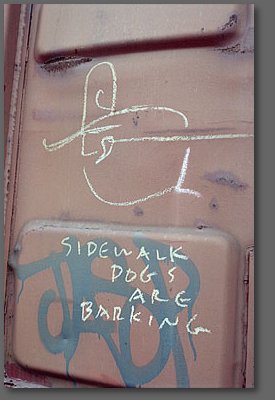 sidewalk dogs are barking