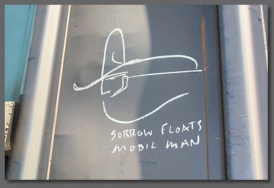 sorrow floats, mobile man