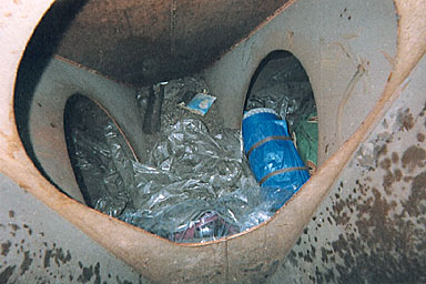 grain car and the hole with backpack in it