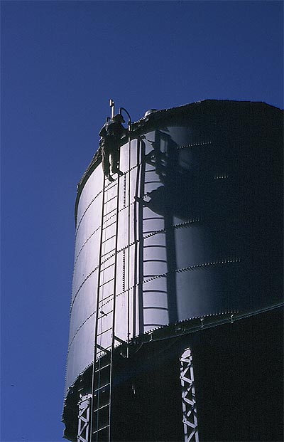 Ben, a crusty punk, tagging the Black Butte watering tank, built in 1926