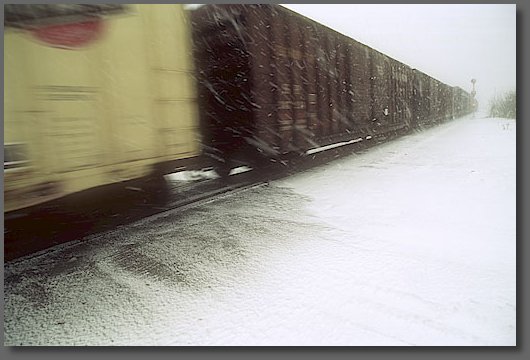 Northbound train at the road crossing