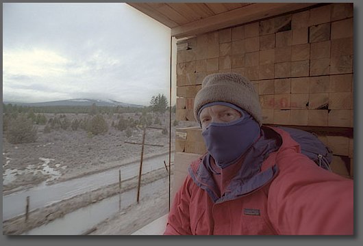 Riding between stacks of lumber - south of Klamath Falls